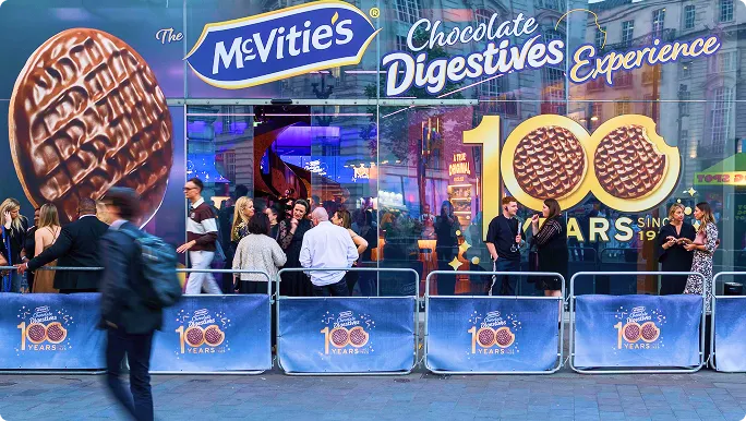 Visitors queue to enter the McVitie’s Chocolate Digestives Experience in London
