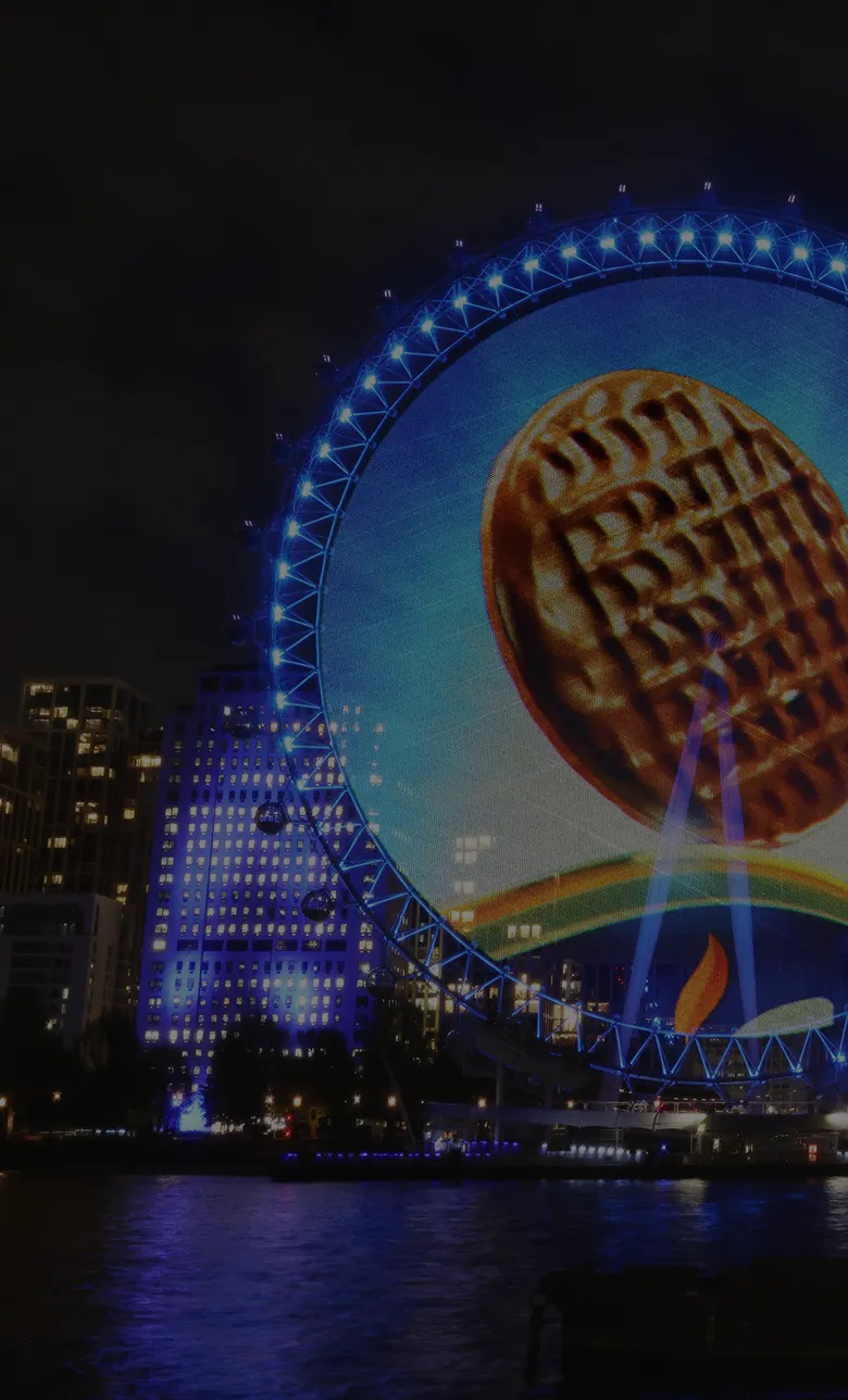 Projection of a Chocolate Digestive on the lastminute.com London Eye